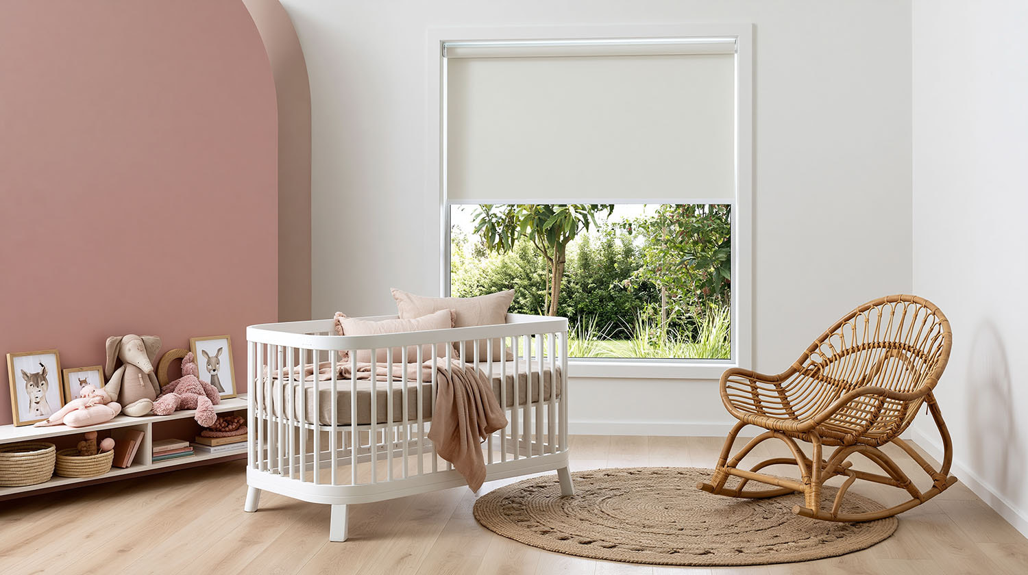 Blockout roller blind in a dusty pink nursery
