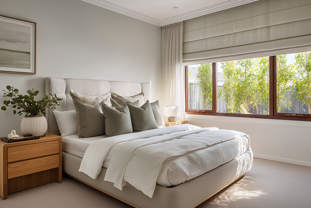 Roman Blind Paired with Sheer Curtains in the Bedroom.